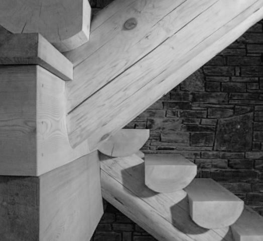 Carved Cedar Log Staircase Crafted by Lloyoll Timber-Framers